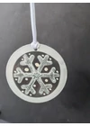 White hand-painted snowflake-shaped glass ornament