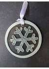 White hand-painted snowflake-shaped glass ornament