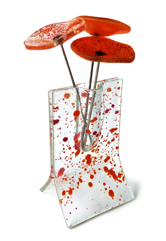 Small transparent 8x13 cm red-orange spotty vase with 3 small flowers