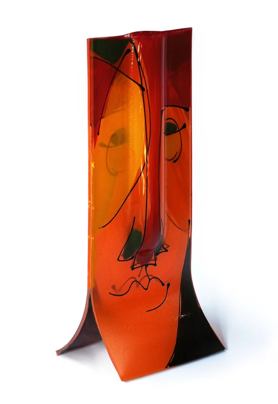 Glass vase made using the burn-in technique in an orange and black color scheme reminiscent of a cubist face, 14x36 cm